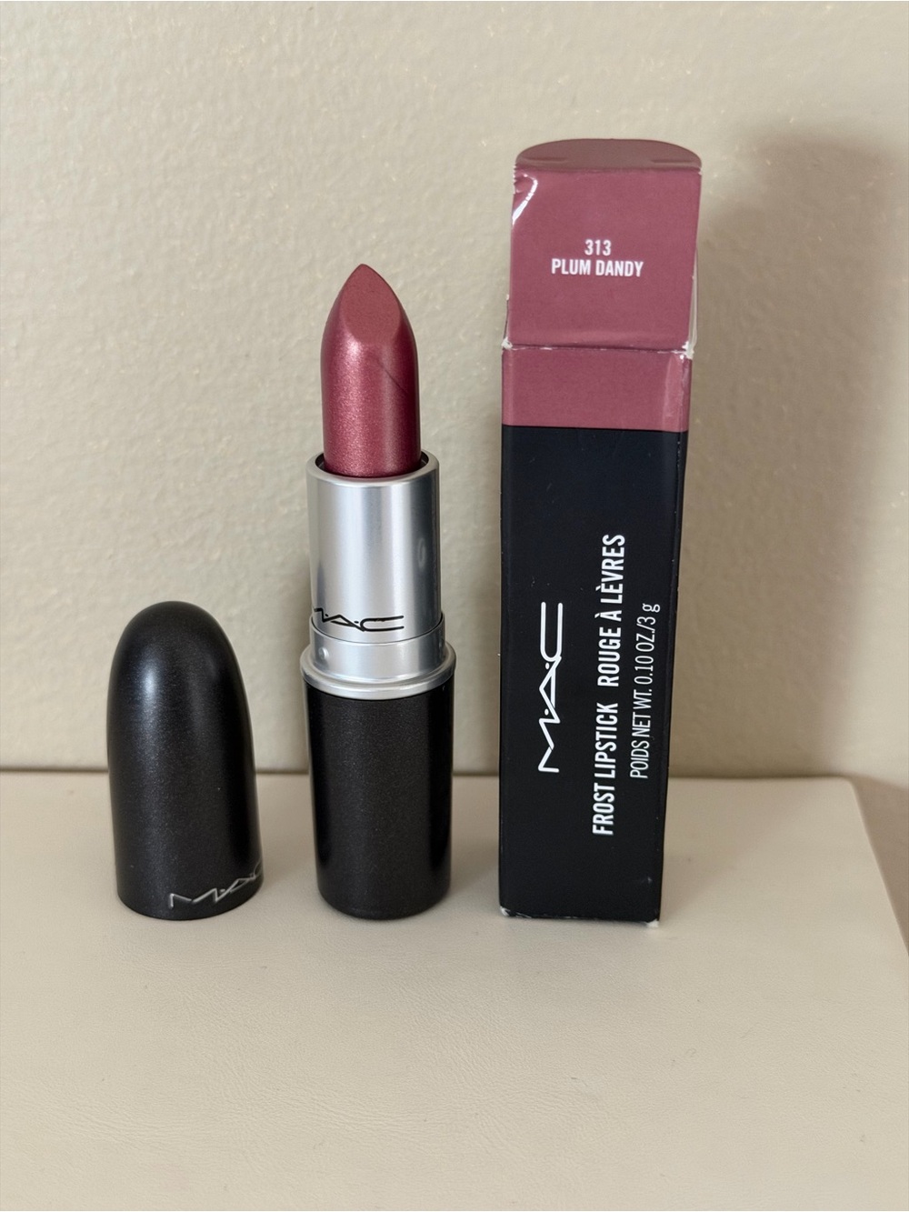 MAC Cosmetics Frost lipstick 
PLUM DANDY